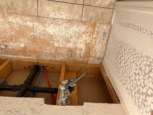 Water damage extraction In bathroom.