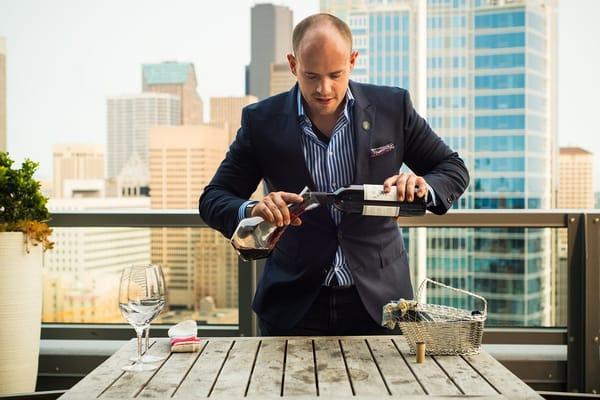 Nick Davis of Medium Plus, demonstrating red wine decanting.