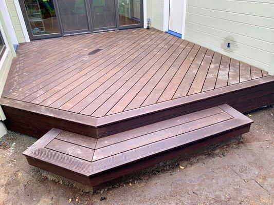 Ignore the cat footprints. Steve was the one that suggested the edging pattern we did on the deck and the stair and it came out so nicely.