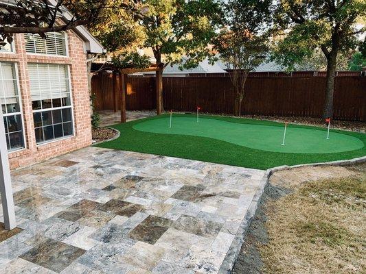 Travertine and turf.