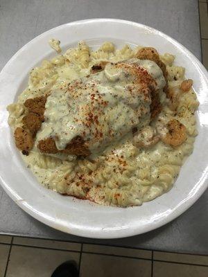 Catfish over shrimp pasta