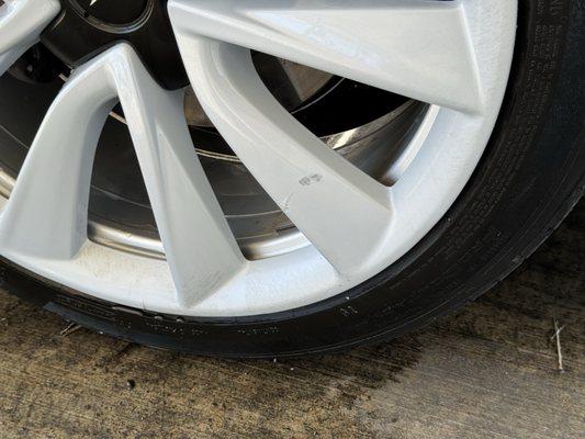 Gouged wheel by the car wash