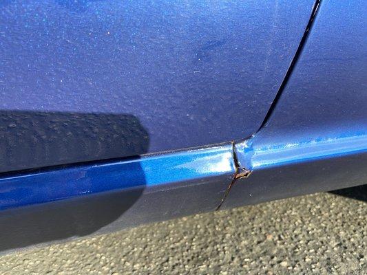 Rust forming in the rocker panel.