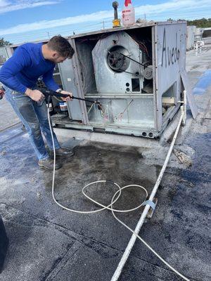 Roof top unit cleaning and sanitizing