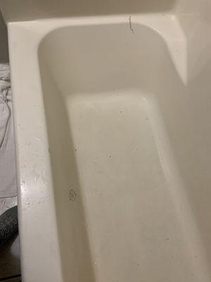 Cracked and stained tub