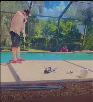 Patrick Cleaning the pool and scrubbing the walls, and Crystal is taking notes and providing a detailed summary