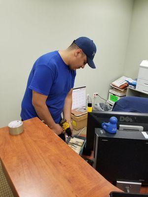 Disassembling furniture at a law firm in Florham Park NJ