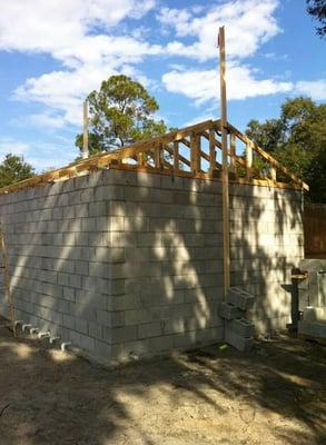 The original pumphouse was involved in a fire. We rebuilt it and the owner wanted something to use as a storm shelter as well...