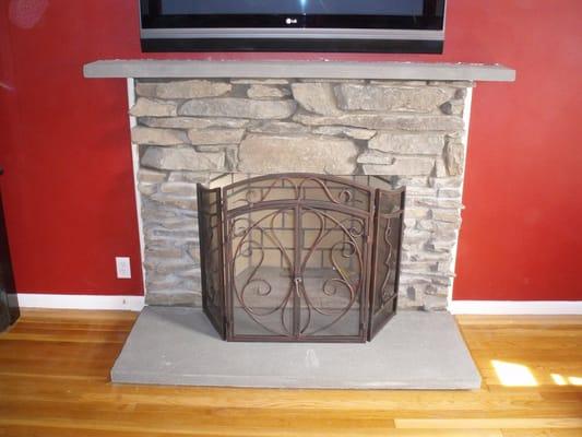 Stone fireplace, Stoughton, MA.  Rebuilt brick fireplace, custom work, prepared for gas log installation.