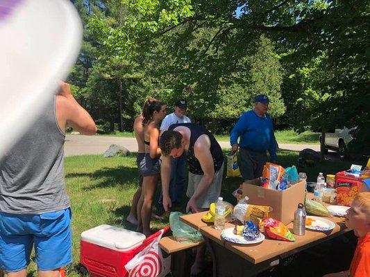 Picnic on the river at Peterson Bridge, halfway on our canoe trip.