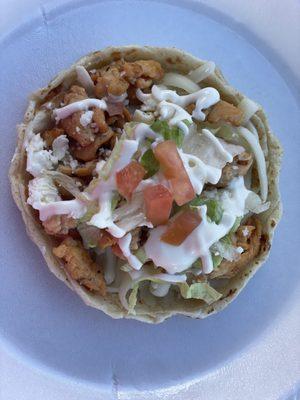 Sope- choice of meat on a bed of beans and mozzarella cheese topped of with lettuce, tomatoes,queso fresco and sour cream