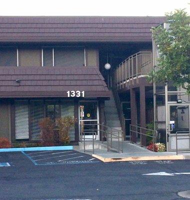 Office from parking lot. Lift at right.