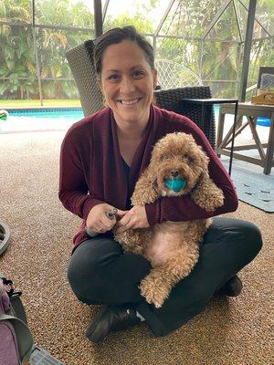 Fear free in home nail trims means they can hold their favorite toys while getting a pawdicure.