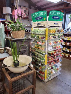 Seed packets and water plants