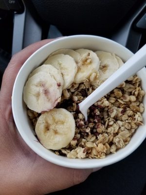 Small acai bowl with banana and granola