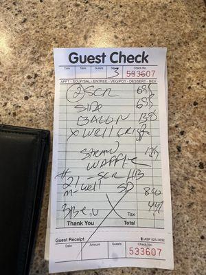 Bill for eggs w bacon, waffles, the burger w eggs breakfast