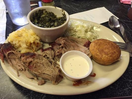 Pulled pork with white sauce (ask for it!), hashbrown casserole, turnip greens, coleslaw, and cornbread.