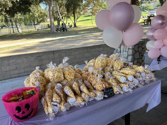 The front were the 50 bags of cone shaped favors. The back were the additional bags we got. We had so much extra popcorn