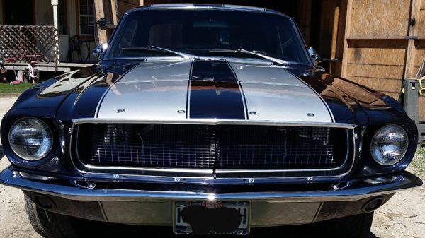 Blue 1967 Mustang with silver stripes!