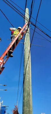 Running fiber optic cable from building to building.