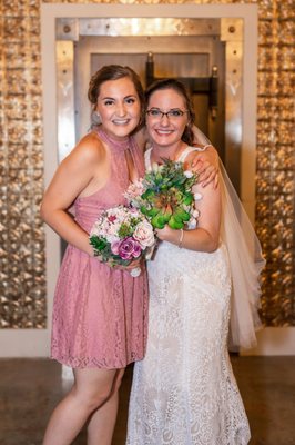 Bride and sister at pop-up wedding.