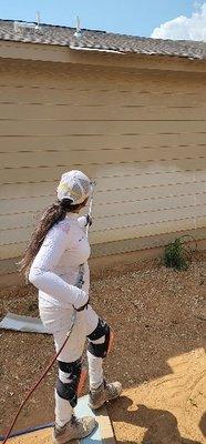 Owner spraying the exterior of Lennar Homes in Seguin, Texas.