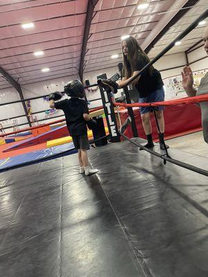 One of the play areas -- they have a table set up with pads/helmets/etc. everything you need to get in the ring if you choose.