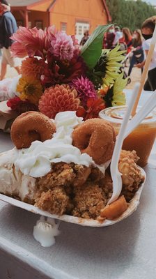 Apple crisp with vanilla ice cream and whipped cream. We bought the apple cider donuts and placed them on top for our photo haha!