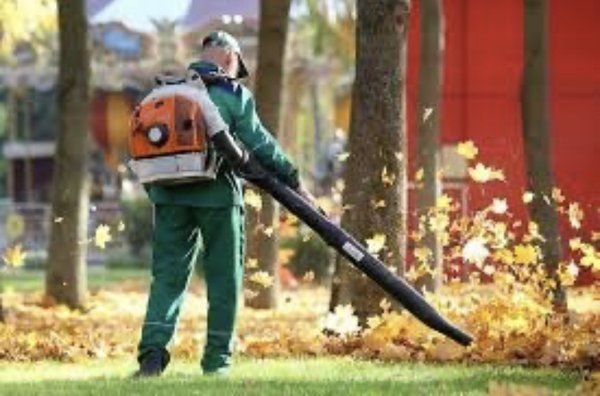 Landscape maintenance being performed.