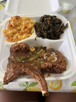 Pork chops with mac and cheese and greens