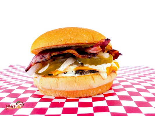 Smash Halal Beef Patty With Fresh Sauteed Onions, Crispy Onion Strips, Cheese, Pickles, Halal Bacon and Express Sauce on A Potato Roll