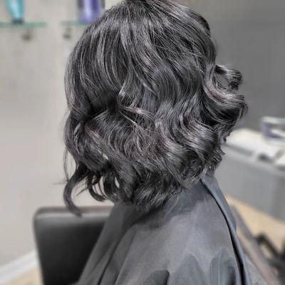 Haircut with lived in curls