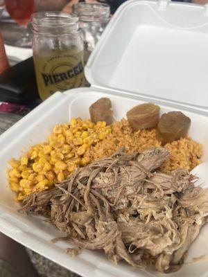 Pork shoulder with rice, potatoes and corn