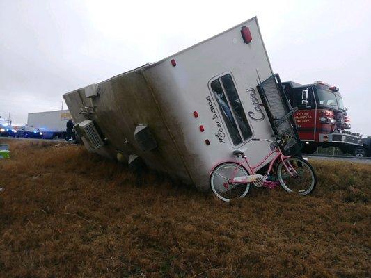 My camper and contents went from this on the side of the road to this next photo in their yard.