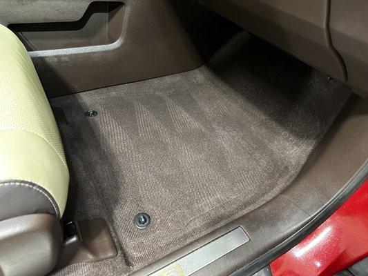 Floor board of Lexus after cleaning carpet