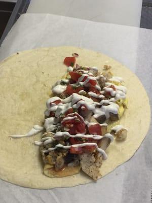 Come try a chicken breakfast burrito with homemade pico de gallo and lime crema!