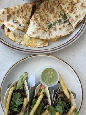 Queso birria braised short rib quesadilla & Mediterranean mushroom tacos