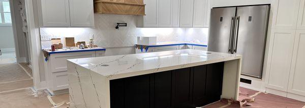 Kitchen Island with waterfall legs on both sides and overhang