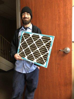 Technician Travis! Showing us what a dirty filter can look like, if yours looks like this call us!!