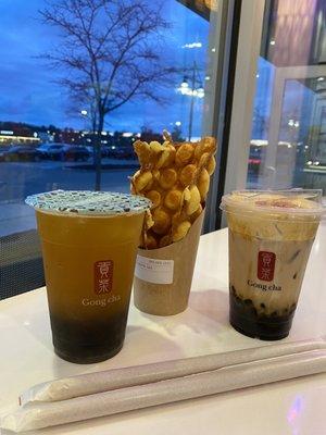 Passion fruit green tea with boba and crème brûlée brown sugar milk tea pair with bubble waffle