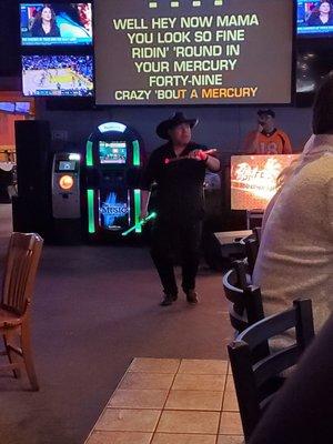 What is he even doing!? Also, how do you run the karaoke and only know every 6th word of the song.