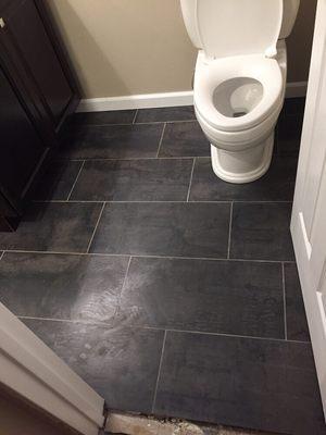 Tile, toilet and vanity installation