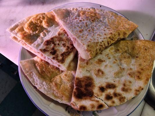 al pastor quesadillas With cheese cilantro in onions