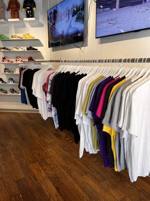 Hanging clothing rack filled with streetwear