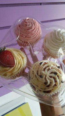 Left to right: strawberry cream, red velvet, wedding cake, classic strawberry