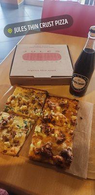 Potato Carbonara pizza and Lovebird's Nashville Hot pizza