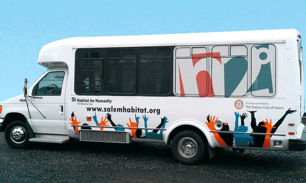 Transportation vehicle with branded vinyl.