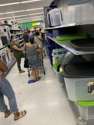 How are customers supposed to reach products if the lines are going back through them?!!