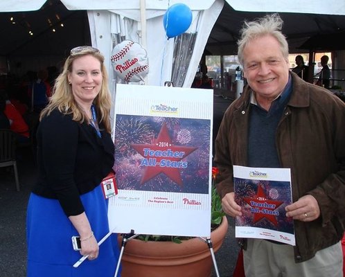 Peter (right) and client Meghan Essman, director of fan development and educational programs for the Philadelphia Phillies, s...