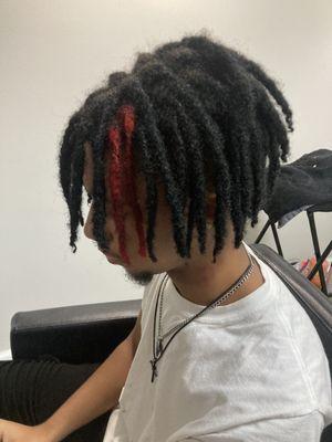 Medium loc retwist also color service with pop of color